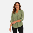 Women's elegant V-neck long sleeve blouse by FJØRNA, stylish casual top with a sophisticated design and fitted silhouette.