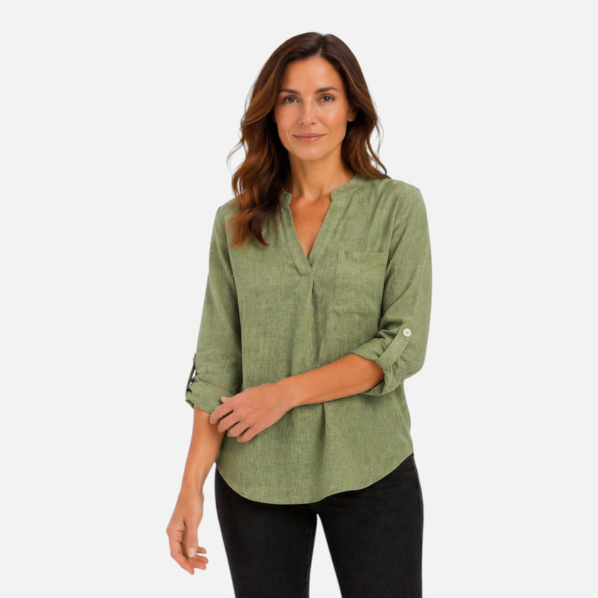 Women's elegant V-neck long sleeve blouse by FJØRNA, stylish casual top with a sophisticated design and fitted silhouette.