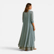 Women’s floral embroidered maxi dress with chiffon jacket set by FJØRNA, featuring delicate embroidery and flowing fabric.