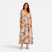 Women’s boho floral print V-neck maxi dress by FJØRNA, flowing fabric with vibrant floral pattern, sleeveless design.
