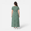 Women's floral V-neck midi dress by FJØRNA, perfect for summer occasions and wedding guest attire, shown in a stylish design.