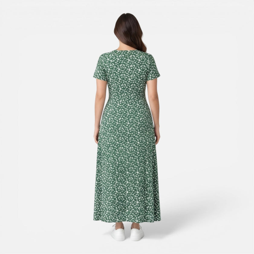 Women's floral V-neck midi dress by FJØRNA, perfect for summer occasions and wedding guest attire, shown in a stylish design.