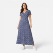 Women's floral V-neck midi dress by FJØRNA, perfect for summer occasions and wedding guest events.