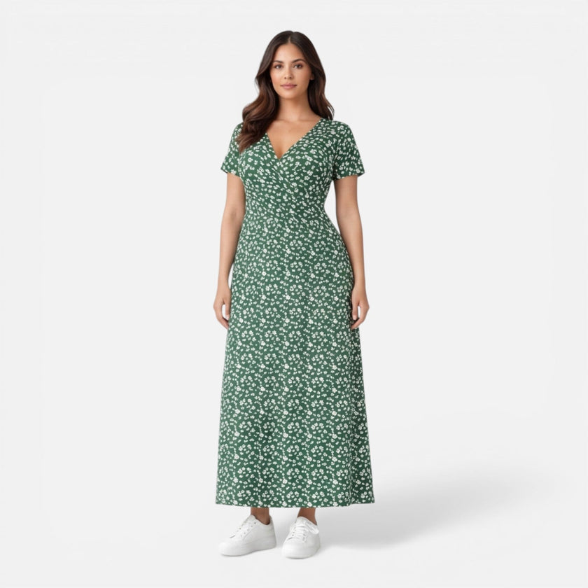 Women’s floral V-neck midi dress by FJØRNA, featuring a lightweight summer design perfect for occasions like weddings or parties.