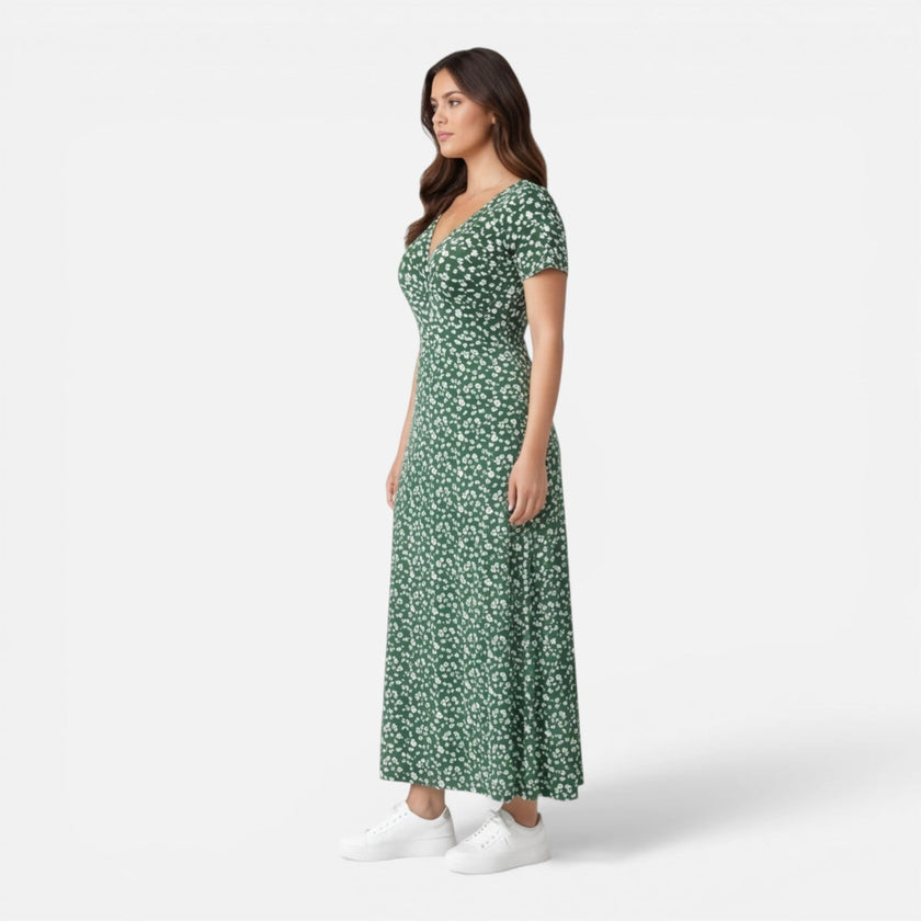 Women’s floral V-neck midi dress by FJØRNA featuring a feminine design, perfect for summer occasions and wedding guest attire.