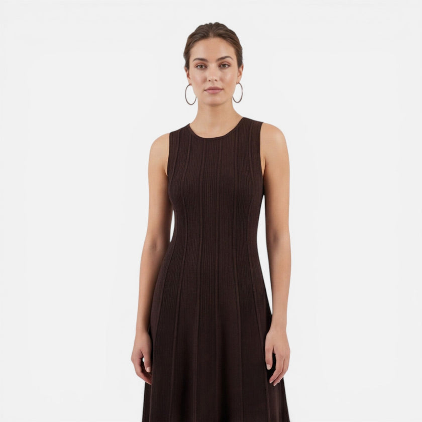FJØRNA women's sleeveless formal maxi dress with pleated design, perfect for wedding guests and elegant occasions.