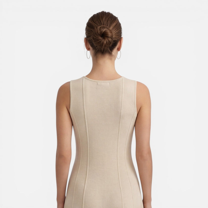 FJØRNA women's sleeveless formal maxi dress with pleats, perfect for wedding guests, elegant and stylish for special occasions.