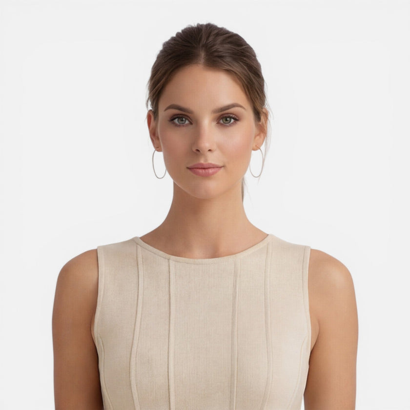 FJØRNA women's sleeveless formal maxi dress with pleated design, ideal for wedding guest attire, shown in a stylish silhouette.