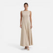 Women's sleeveless formal maxi dress with pleats by FJØRNA, perfect for wedding guest attire, shown in a stylish elegant design.