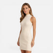 Women's slim fit knit mini dress by FJØRNA featuring sleeveless design and mock neck neckline, shown in a stylish fit.