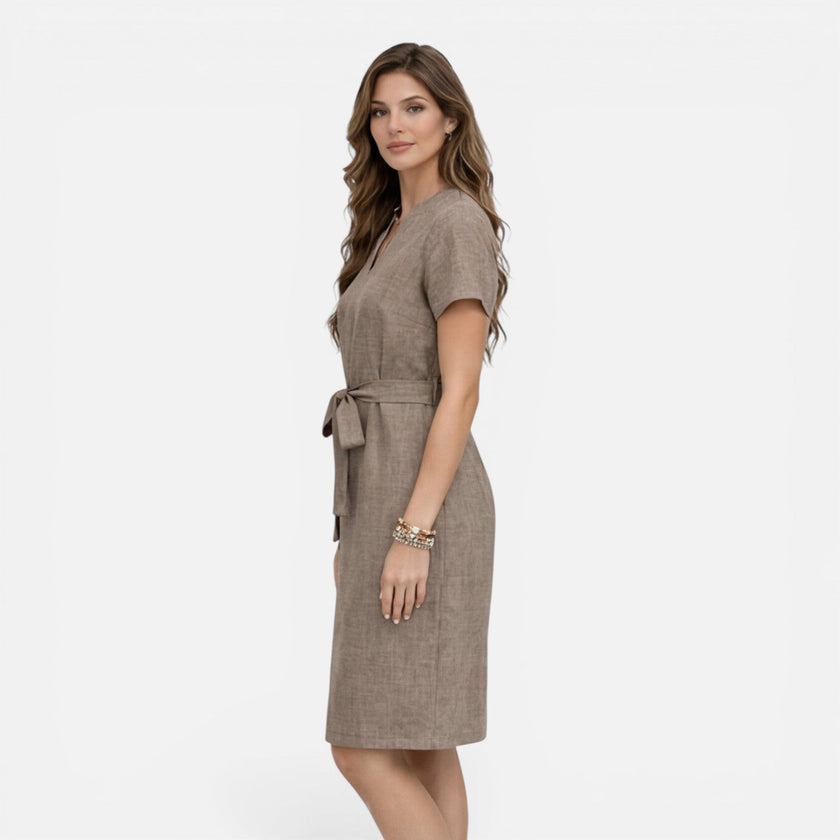 Lightweight women's midi dress with V-neck, short sleeves, and belt from FJØRNA, styled for casual or summer wear.