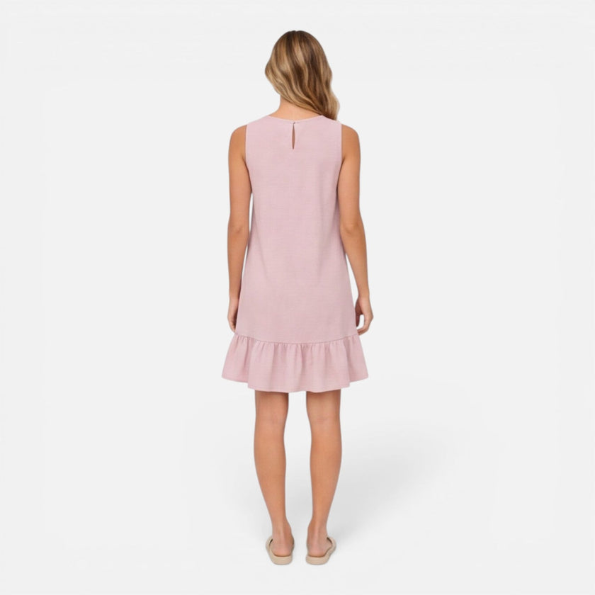 Women’s lightweight sleeveless summer dress by FJØRNA with an A-line silhouette and ruffle hem, perfect for warm weather.