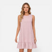 Women's lightweight sleeveless summer dress by FJØRNA with an A-line silhouette and ruffle hem, perfect for warm weather.