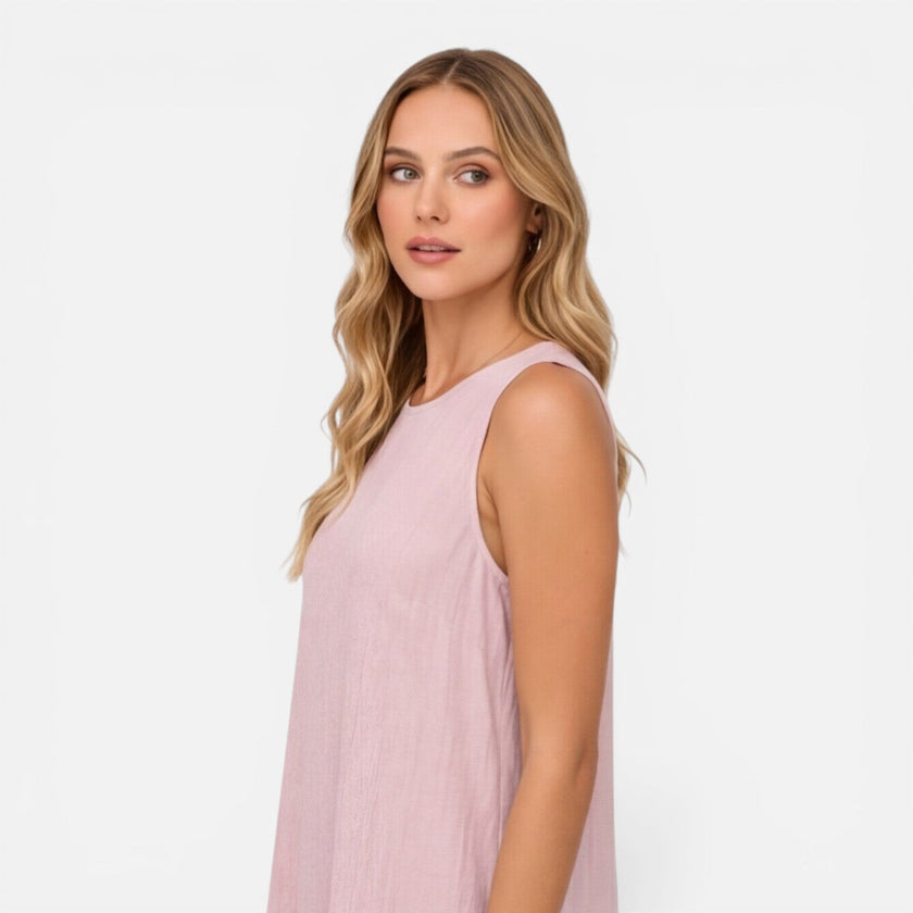 Women’s lightweight summer dress by FJØRNA featuring sleeveless design, A-line silhouette, and ruffle hem, perfect for warm weather.