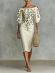 White FJØRNA floral one-shoulder midi dress with embroidery, waist-length, short sleeves, perfect for summer or casual occasions.