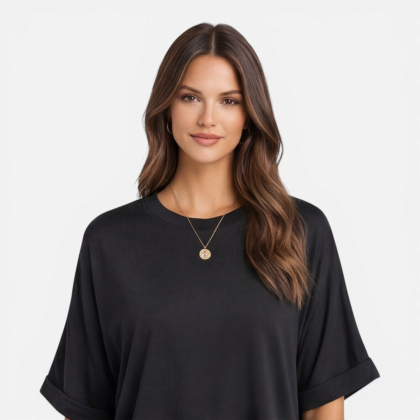 Women’s oversized cotton T-shirt by FJØRNA featuring a relaxed fit, lightweight breathable fabric, ideal for daily casual wear.