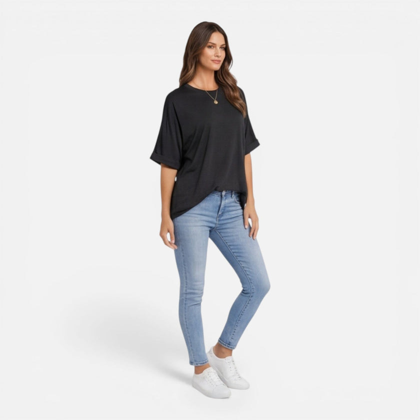Women’s oversized cotton T-shirt by FJØRNA, relaxed fit, lightweight, breathable daily wear shirt.