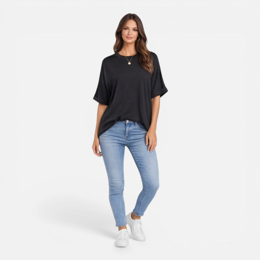 Women’s oversized cotton T-shirt by FJØRNA, relaxed fit, breathable lightweight fabric, perfect for daily casual wear.