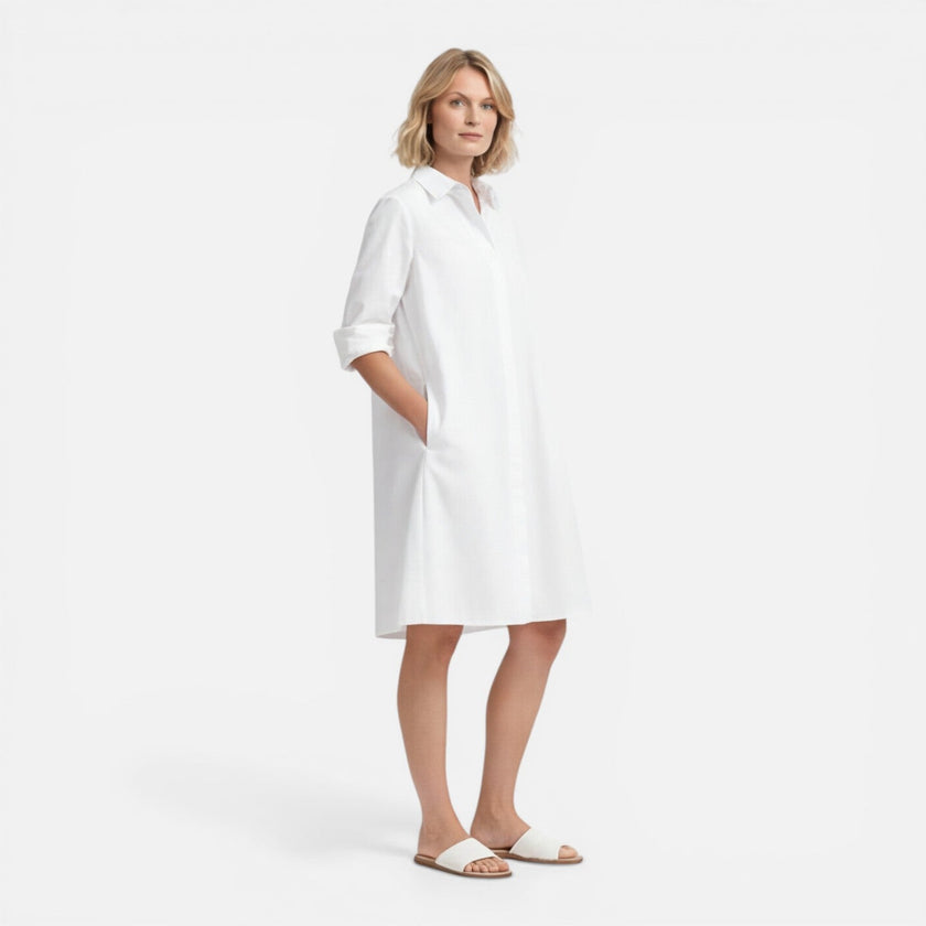 Lightweight women's shirt dress by FJØRNA featuring a loose fit and midi length, perfect for comfortable everyday wear.