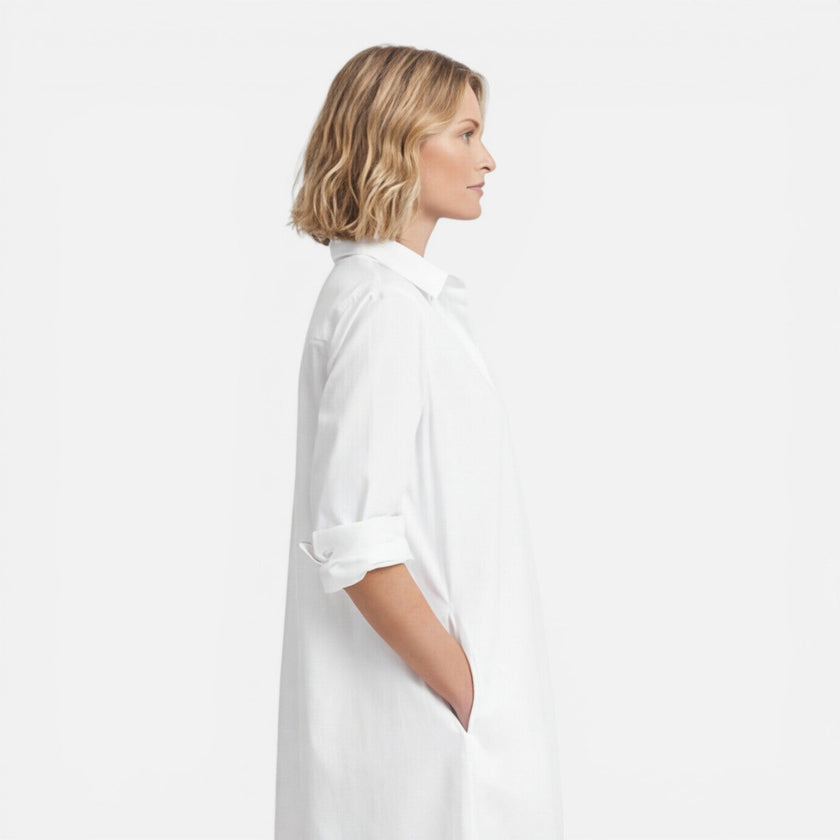 Women's lightweight FJØRNA shirt dress with a loose fit, midi length, and comfortable, casual style.