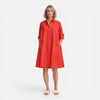 Lightweight women's shirt dress by FJØRNA featuring a comfortable, loose fit midi length in natural fabric.