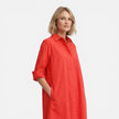 Women’s lightweight, comfortable loose-fit shirt dress by FJØRNA, midi length, perfect for casual and warm weather wear.