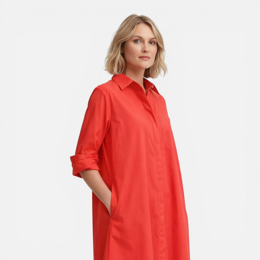 Women’s lightweight, comfortable loose-fit shirt dress by FJØRNA, midi length, perfect for casual and warm weather wear.