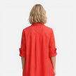 Lightweight women's shirt dress by FJØRNA, comfortable loose fit midi style shown on a model.