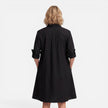 Women's lightweight FJØRNA shirt dress with a comfortable loose fit and midi length, perfect for casual wear.
