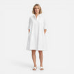 Women’s lightweight, comfortable loose-fit midi shirt dress by FJØRNA, styled with a relaxed fit and casual elegance.