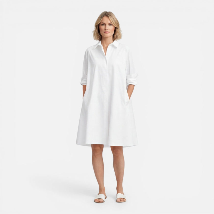 Women’s lightweight, comfortable loose-fit midi shirt dress by FJØRNA, styled with a relaxed fit and casual elegance.