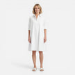 Women's lightweight, comfortable loose-fit midi shirt dress by FJØRNA featuring a relaxed fit and casual style.