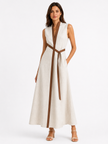 Women’s sleeveless midi dress with stand collar by FJØRNA, featuring a relaxed fit and stylish design.