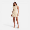 Women's elegant sleeveless mini dress with draped neckline by FJØRNA, perfect for weddings or formal events.
