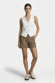 Slim fit white women's waistcoat by FJØRNA, sleeveless tailoring for layered, elegant look; full-body view.