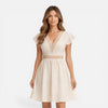 Women's lightweight V-neck summer dress by FJØRNA featuring an A-line silhouette and lace waist detail.
