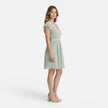 Women's lightweight V-neck summer dress by FJØRNA featuring an A-line silhouette and lace waist detail.