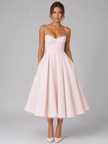 FJØRNA women's corset midi dress with full skirt, elegant occasion style, featuring fitted bodice and flowing skirt, perfect for formal events.