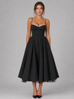 FJØRNA women's corset midi dress with full skirt, elegant occasion style, featuring fitted bodice and flowing skirt in a sophisticated design.