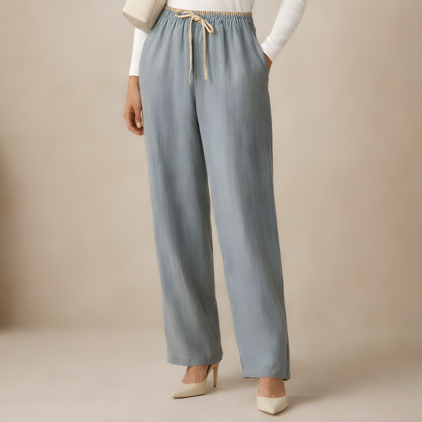 Women’s cotton linen trousers with drawstring waist and pockets, relaxed fit, by FJØRNA.