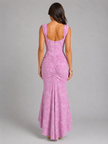 Women's floral corset maxi dress with asymmetrical hem, elegant silhouette, perfect for wedding guests by FJØRNA.