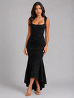 Women's floral corset maxi dress by FJØRNA featuring an asymmetrical hem, sculpted silhouette, perfect for wedding guests.