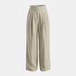Women’s high-waisted linen wide-leg trousers by FJØRNA, tailored pants with a relaxed fit and elegant design.