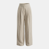 Women’s high-waisted linen wide-leg trousers by FJØRNA, tailored pants with a relaxed fit and elegant design.