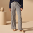 Women's FJØRNA striped drawstring trousers with a relaxed fit and comfortable waistband, perfect for casual wear.