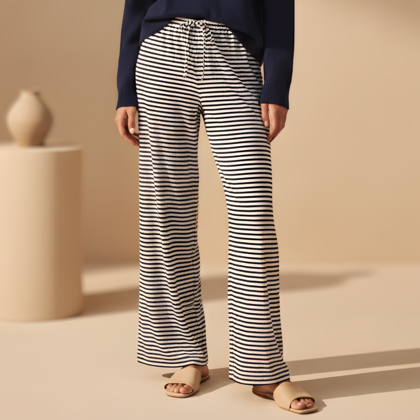 Women's FJØRNA striped drawstring trousers with a relaxed fit and comfortable waistband, perfect for casual wear.