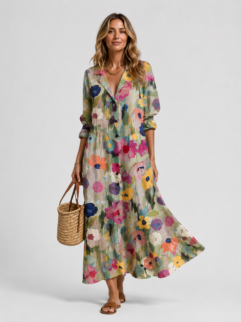 Women’s floral print maxi shirt dress by FJØRNA featuring a button front, relaxed fit, and elegant design.