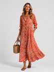 Women's floral print maxi shirt dress with button front by FJØRNA, relaxed fit and elegant design for casual or dressy occasions.
