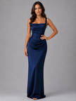 Women's satin feel maxi dress with ruched waist by FJØRNA, featuring a sculpted fit perfect for wedding guest attire.