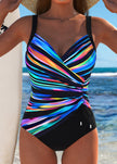 Women's FJØRNA printed tummy control one-piece swimsuit with a flattering design, ideal for stylish swimming and beachwear.